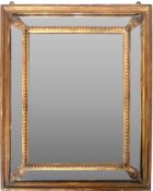 19TH CENTURY VICTORIAN GILT GESSO CUSHIONED FRAME MIRROR