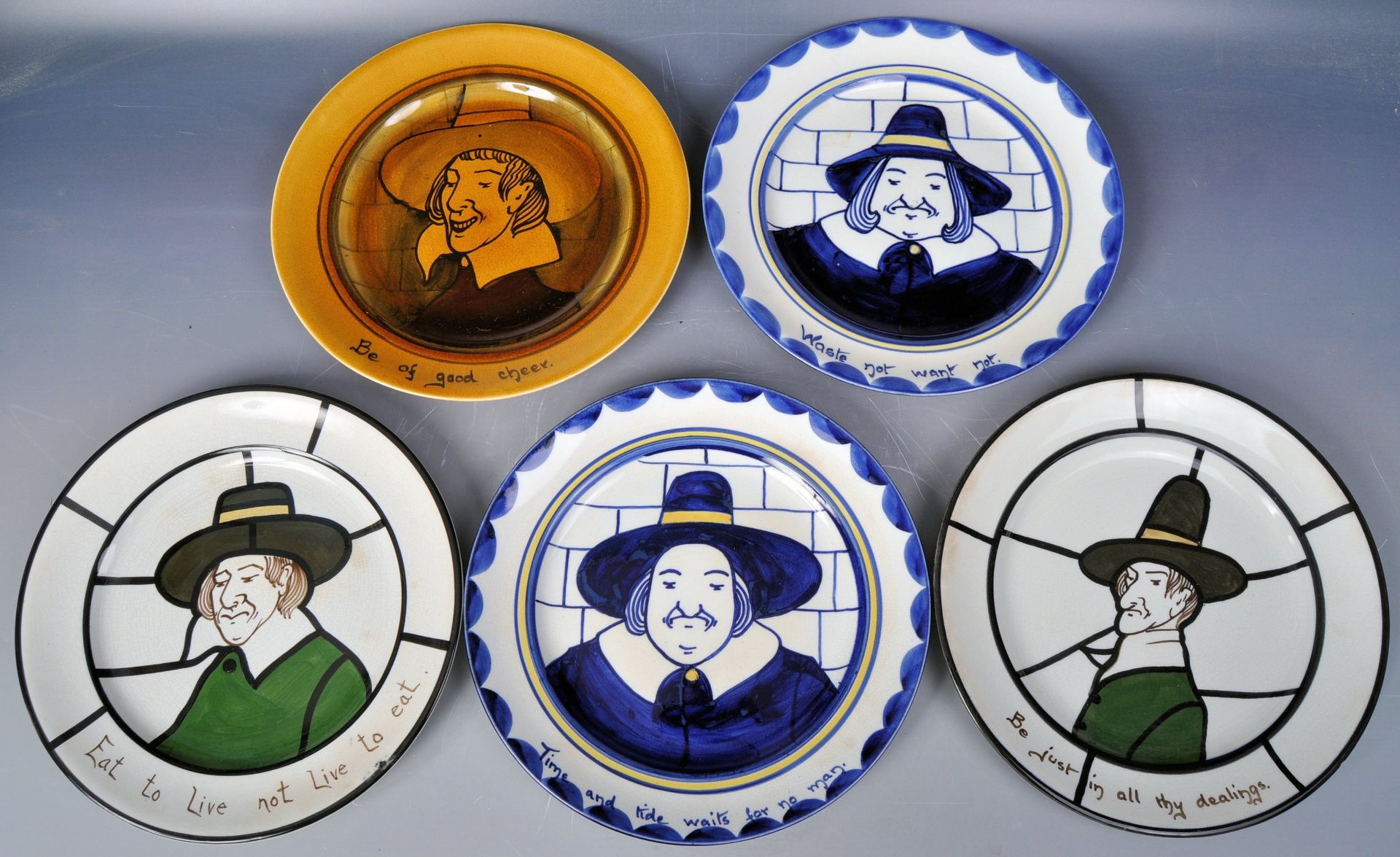 COLLECTION OF FIVE BRISTOL POTTERY PURITAN PLATES