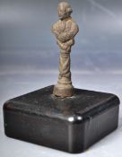 18TH CENTURY LEAD PIPE TAMPER IN THE FORM OF A GENTLEMAN
