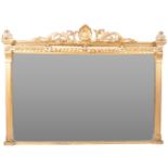 19TH CENTURY GILT OVERMANTEL MIRROR WITH CARVED PEDIMENT TOP