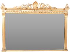 19TH CENTURY GILT OVERMANTEL MIRROR WITH CARVED PEDIMENT TOP