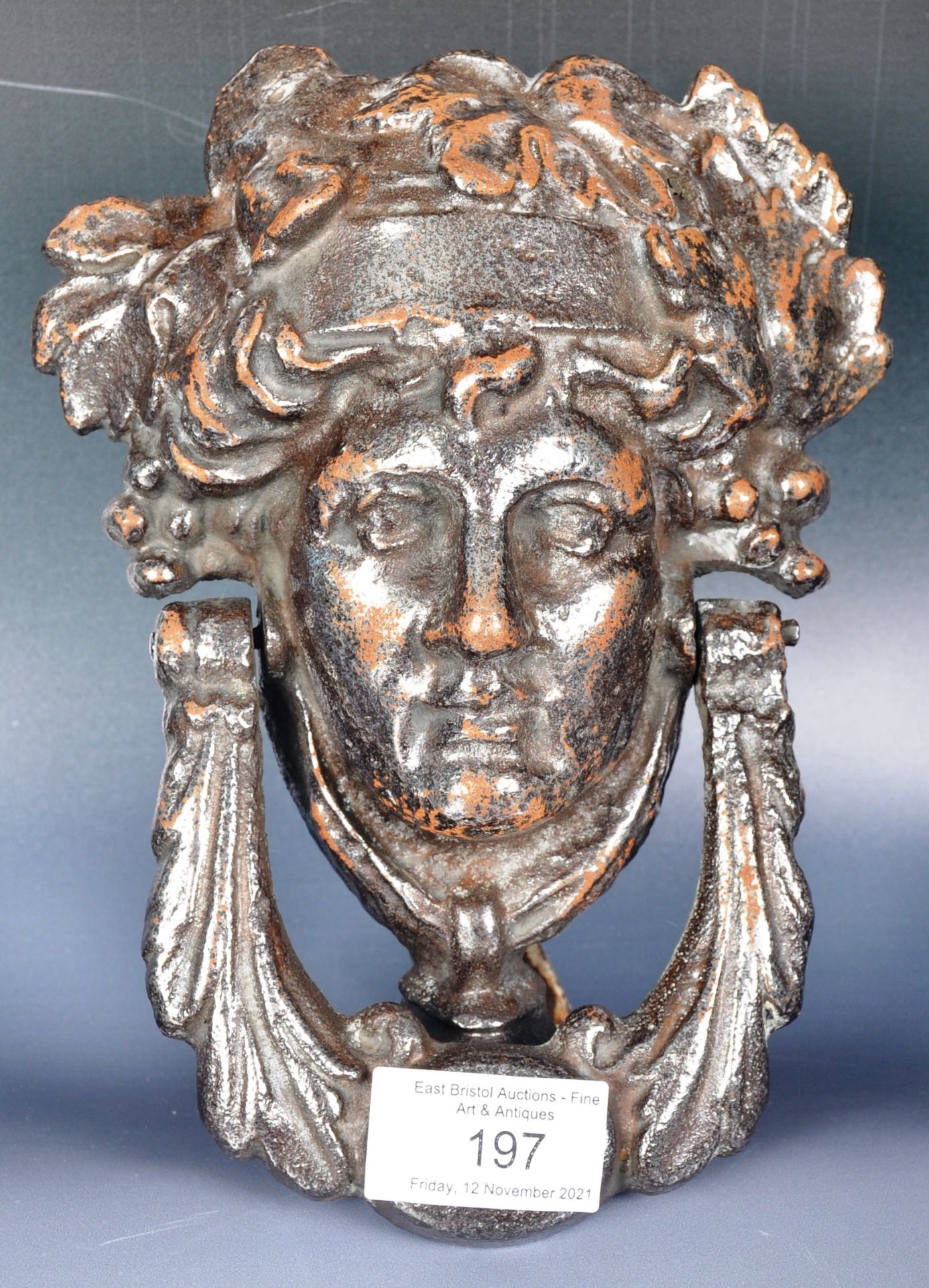 19TH CENTURY CAST IRON FIGURAL DOOR KNOCKER