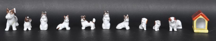 COLLECTION OF 1920’S JAPANESE CERAMIC DOGS FIGURINES