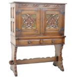 1940'S SPANISH CARVED OAK CUPBOARD WITH PAINTED DETAILING