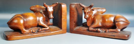 PAIR OF 19TH CENTURY WALNUT WATER BUFFALO BOOKENDS
