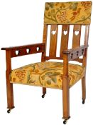 20TH CENTURY ARTS & CRAFTS ARMCHAIR IN THE MANNER OF CFA VOYSEY