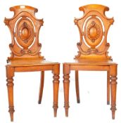 MATCHING PAIR OF VICTORIAN OAK CARVED HALL CHAIRS