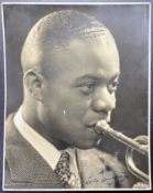 LOUIS ARMSTRONG (1901-1971) - 'SATCHMO' - SCARCE AUTOGRAPHED 8X10" PHOTO