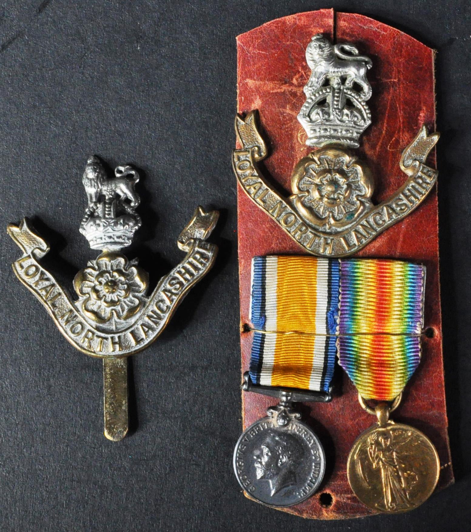 COLLECTION OF ROYAL LANCASHIRE REGIMENT MEDALS AND BADGES