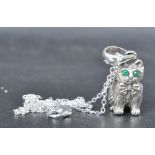 SILVER WHISTLE PENDANT IN THE FORM OF A CAT