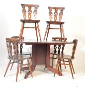 SIX EARLY 20TH CENTURY ERCOL DINING CHAIRS AND DROP LEAF TABLE