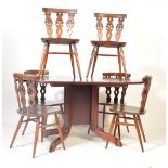 SIX EARLY 20TH CENTURY ERCOL DINING CHAIRS AND DROP LEAF TABLE