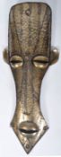 LARGE 20TH CENTURY AFRICAN WALL HANGING MASK OF BRASS CONSTRUCTION