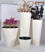 3 LARGE INTERIOR DESIGN FLOOR STANDING INTERIOR DESIGN PLANTERS