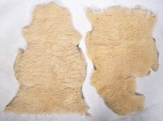 PAIR OF RETRO SHEEPSKIN FLOOR RUGS