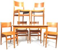 MID 20TH CENTURY SCANDINAVIAN TEAK WOOD DINING TABLE AND CHAIRS