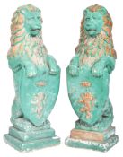MATCHING PAIR OF PAINTED RECONSTITUTED STONE LION FIGURES