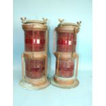 A pair of G & B 'Seahorse' copper NOT Under Command lamps, 52cm high.