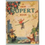 A New Rupert Book, Pub. Daily Express, 1945, slight loss to spine, ownership inscription, not