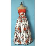 Frank Usher, a 1950's floral cotton sateen evening dress with fitted boned bodice with red chiffon