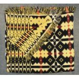 A Welsh wool reversible blanket in red, black, yellow and white, no mill label, 188 x 260cm