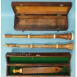Two modern boxwood Baroque oboes, (one split), with brass keys, cased and a wooden pitch pipe with