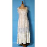 A 1930's silk wedding dress, with hand-made lace insertions, a pair of satin cami-knickers, a silk