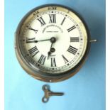 A Sestrel brass bulkhead clock marked Henry Browne & Son Ltd,  19.5cm diameter.