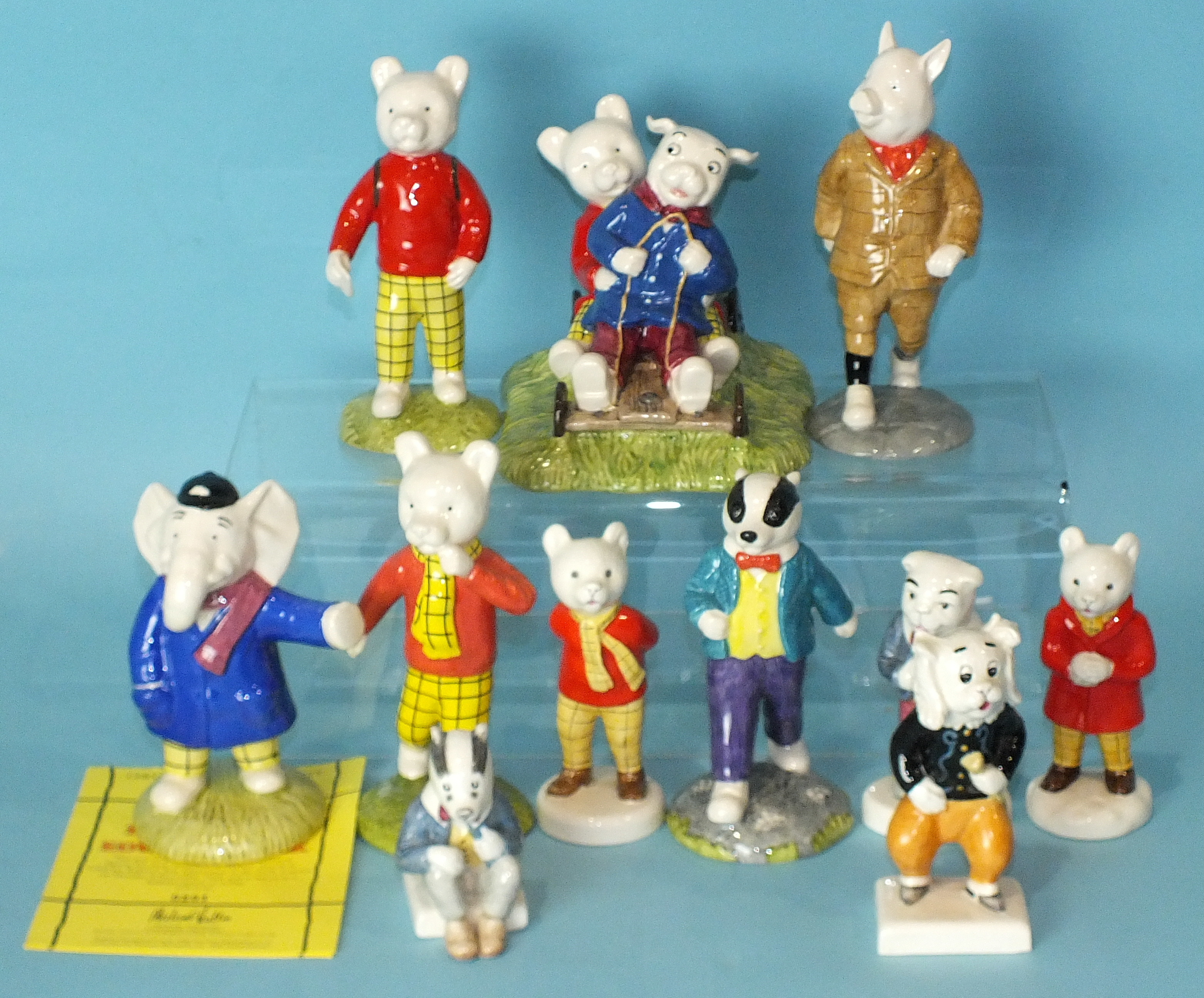 A set of eleven Beswick 'Rupert And His Friends' figurines: 'Rupert The Bear', 'Algy Pug', 'Pong