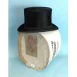 A beaver skin top hat by Dunn & Co, London, approximate size 7.25, in hat box, a child's straw