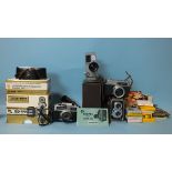 A Zenith E f2 camera, cased and boxed, a Canonet A4 28, a Kopil Electric Eye, cased with