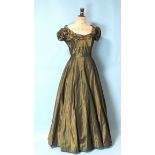 A vintage sea-green taffeta evening gown with boat neck, ruched cap sleeves and seven-gored skirt,