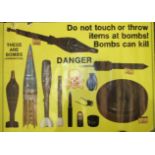 A 1980's Munitions Warning poster, "Don't Touch It, Report It", published by the Namibian Demining