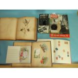 A late-19th century album of pressed leaves and flowers, an album of Victorian Christmas cards, (
