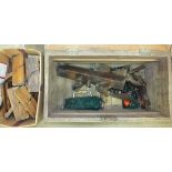 A collection of wooden moulding and other planes, tools and a wooden tool box.