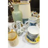 Three studio pottery jugs by Martin Homer, 15cm high, (one with chipped spout), a Poole Pottery cube