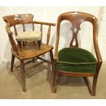 An elm seated spindle-back office armchair, a mahogany framed armchair with upholstered seat on