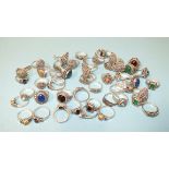 Fifty silver rings, various designs, set marcasite with coloured stones, all marked Silver, gross