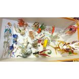 A collection of coloured glass animals,