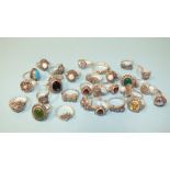 Thirty silver rings, various designs, set marcasite with coloured stones, all marked Silver, gross