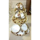 Thirty-three pieces of Royal Albert Lady Hamilton tea ware.
