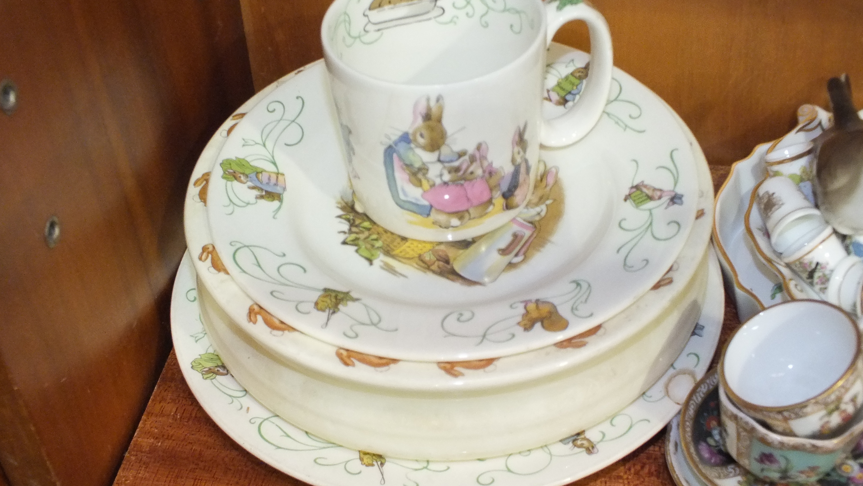 A mid-19th century English porcelain egg cup stand with six matching egg cups (one broken), on paw - Image 3 of 4