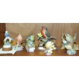A collection of five Royal Worcester birds: Blue Tit no 3199, Robin, no.3197, Chaffinch, no.3240,