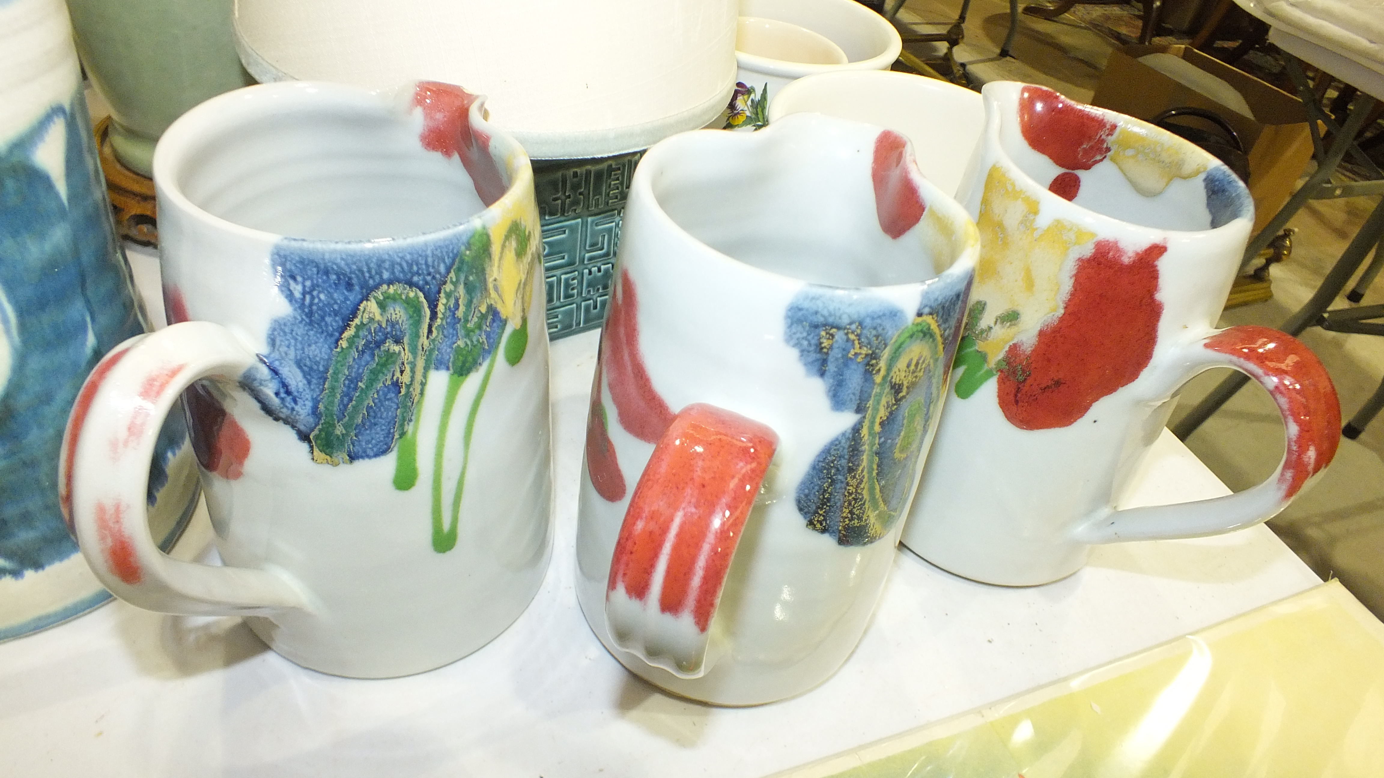 Three studio pottery jugs by Martin Homer, 15cm high, (one with chipped spout), a Poole Pottery cube - Image 3 of 5