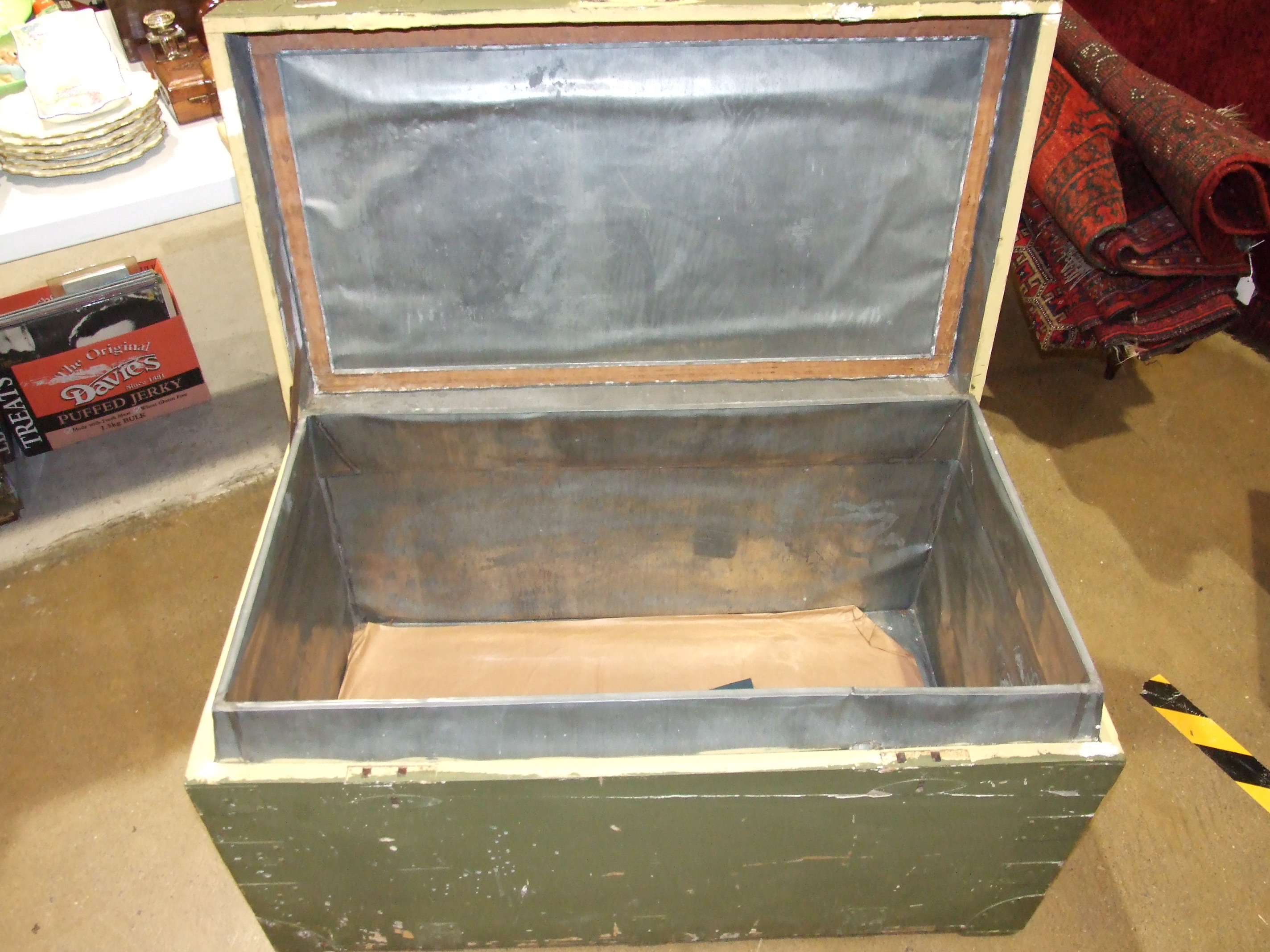 An early 20th century metal bound painted wooden chest with tin lining, 98cm wide, (split to lid). - Image 2 of 4