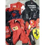 A vintage Ferrari Marlboro Michael Schumacher jacket, another Schumacher Ferrari blue jacket, two