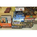 A collection of modern jigsaw puzzles and other items.