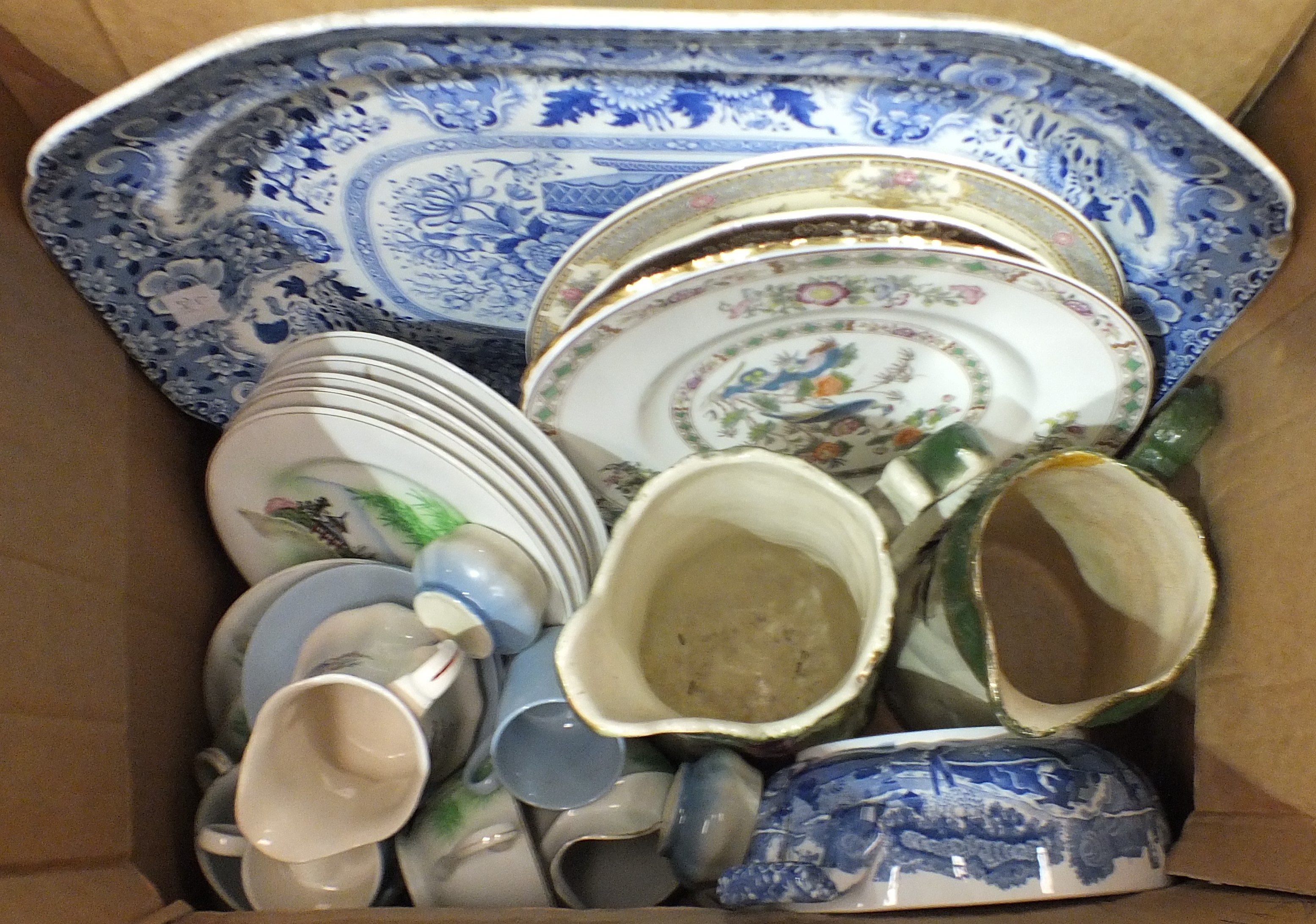 A 19th century blue and white willow pattern supper set, comprising four crescent shaped dishes - Image 4 of 4