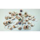 Forty silver rings, various designs, set marcasite with coloured stones, all marked Silver, gross