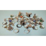 Fifty silver rings, various designs, set marcasite with coloured stones, all marked Silver, gross